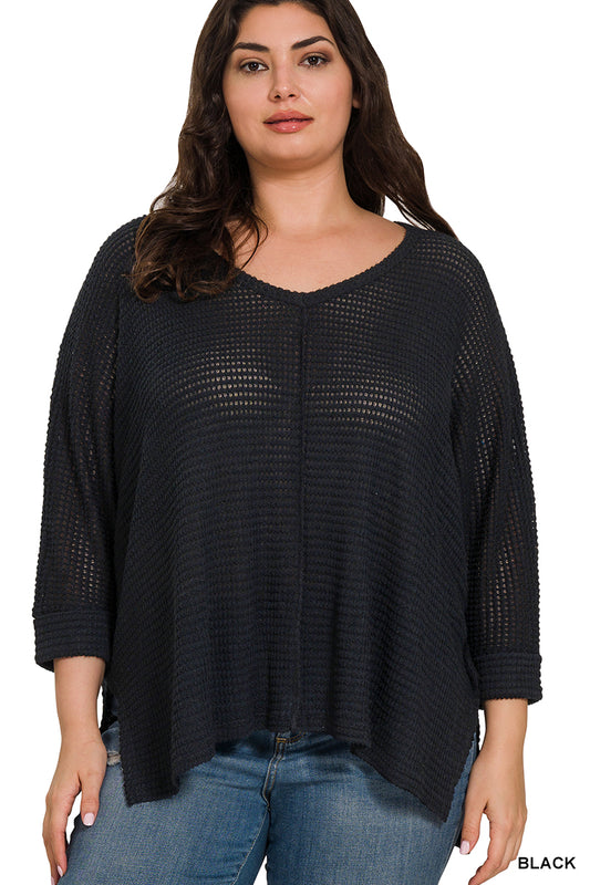 Cozy meets chic in this Plus Size 3/4 Sleeve V-Neck Jacquard Sweater