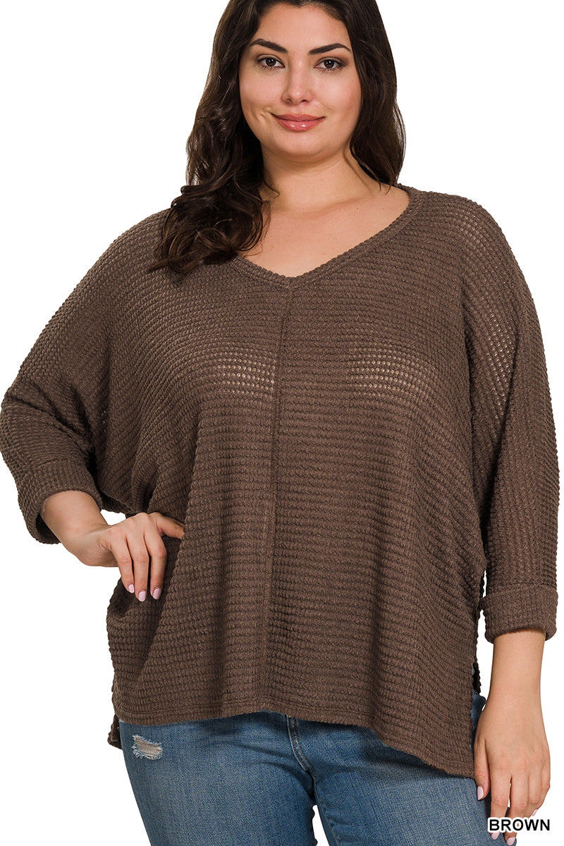 Cozy meets chic in this Plus Size 3/4 Sleeve V-Neck Jacquard Sweater